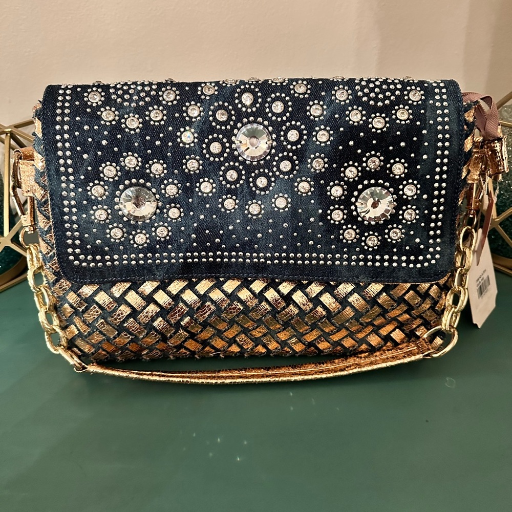 Denim and bling bling clutch style bag with shoulder strap and handle bag